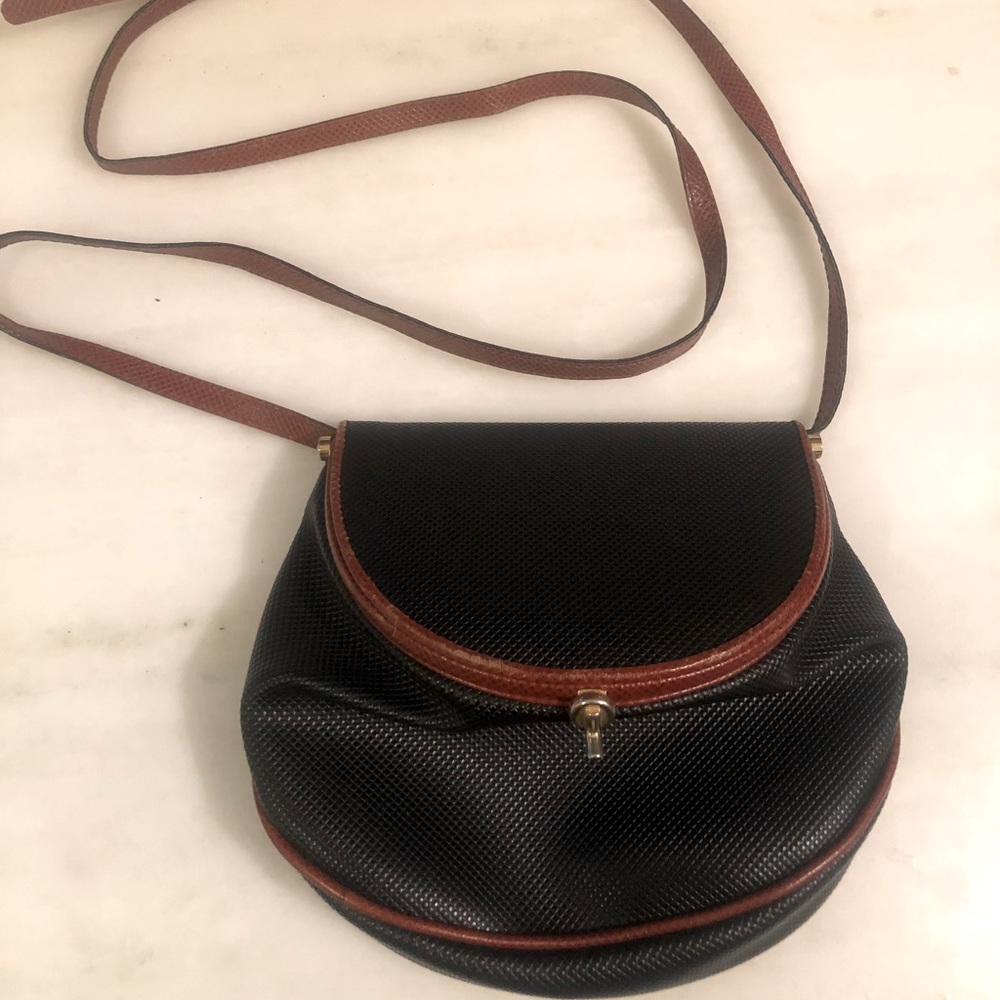Black Marco Polo coated canvas vintage Bottega Veneta crossbody bag.